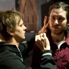 Repetition Svenskbyborna. Jan Pettersson kontrollerar att ljudet fungerar. Foto Stig Hammarstedt